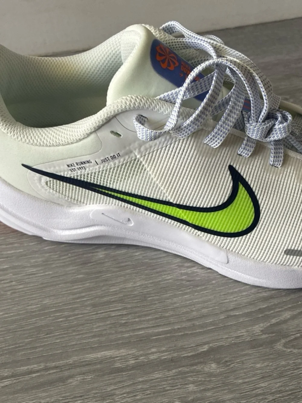 Nike Kids White Sneakers with Neon Lime Swoosh and Blue-White Laces